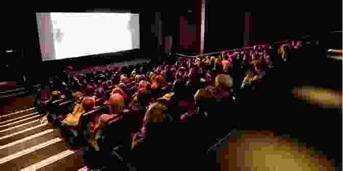 A Group Of People Watching A Documentary Screening With Rapt Attention The Making Of Tornado Chasers: Behind The Scenes Of The Groundbreaking Documentary