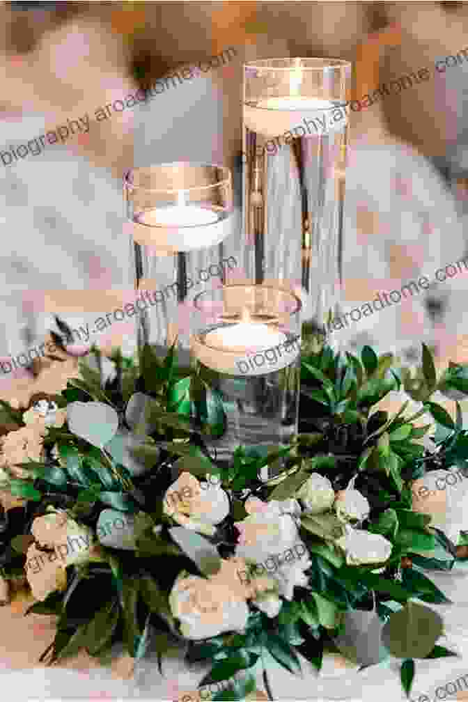 A Stunning Centerpiece With Tall White Candles And Greenery Cascading Over The Sides The Knot Ultimate Wedding Lookbook: More Than 1 000 Cakes Centerpieces Bouquets Dresses Decorations And Ideas For The Perfect Day: More Than 1 000 Decorations And Ideas F Or The Perfect Day