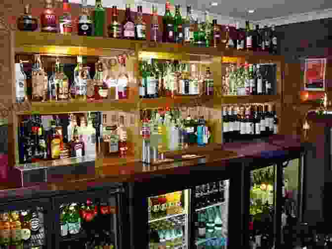 A Well Stocked Home Bar With A Variety Of Spirits And Tools The Essential Bar For Home Mixologists: Tools Techniques And Spirits To Master Cocktails