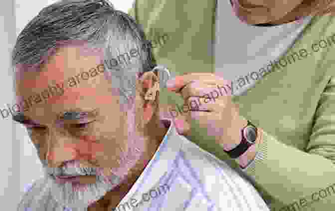 Close Up View Of An Audiologist Adjusting A Hearing Aid On A Patient's Ear During A Clinical Research Session Clinical Topics In Hearing Aid Research