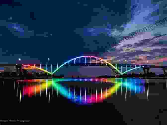 Nighttime View Of The Rainbow Bridge Illuminated In Colorful Lights Wind Resistant Design Of Bridges In Japan: Developments And Practices